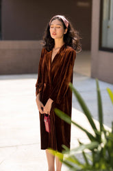 Tailored velvet midi dress with structured lapels and long sleeves for elegant occasions